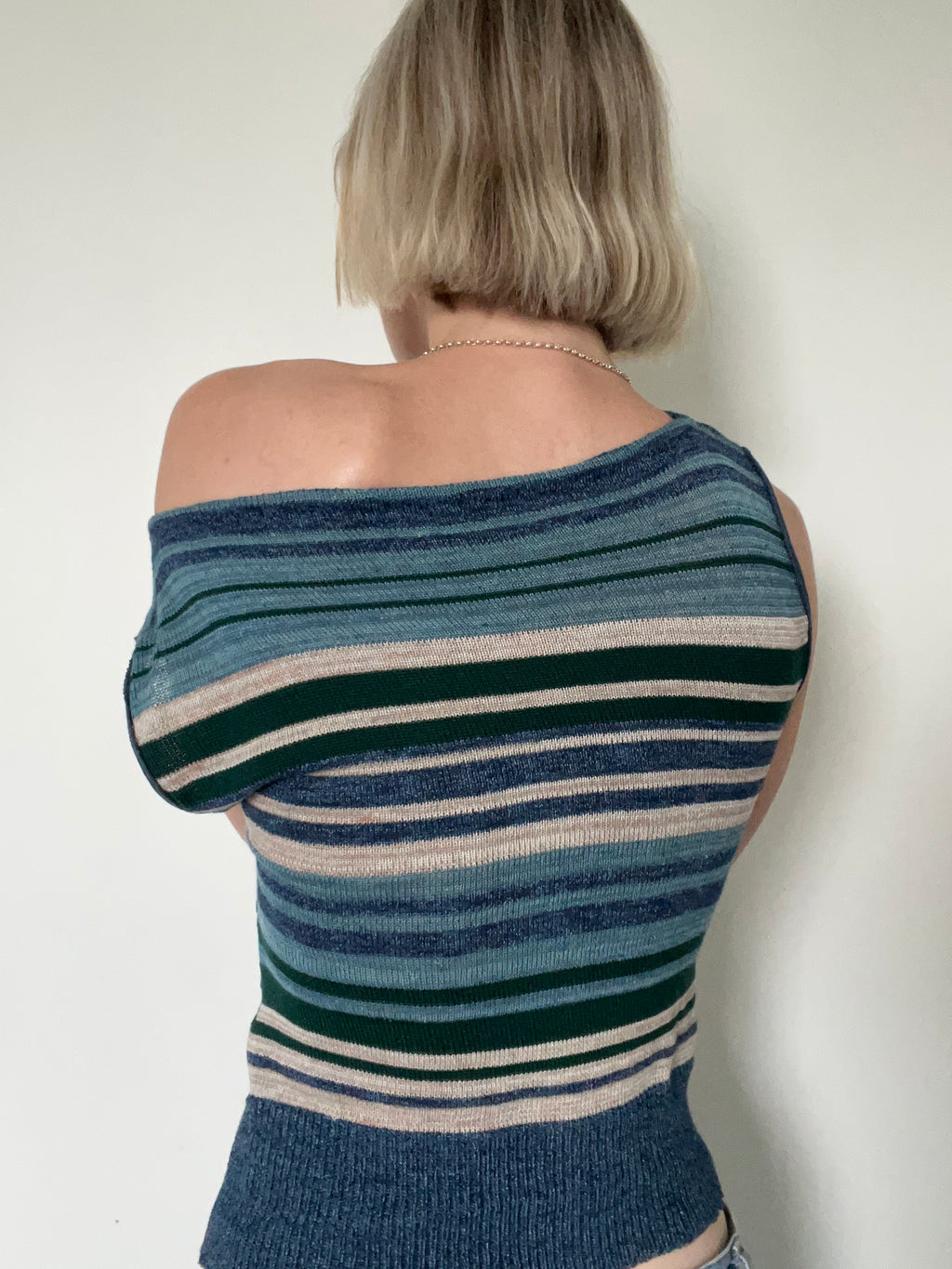 Asymmetric striped top