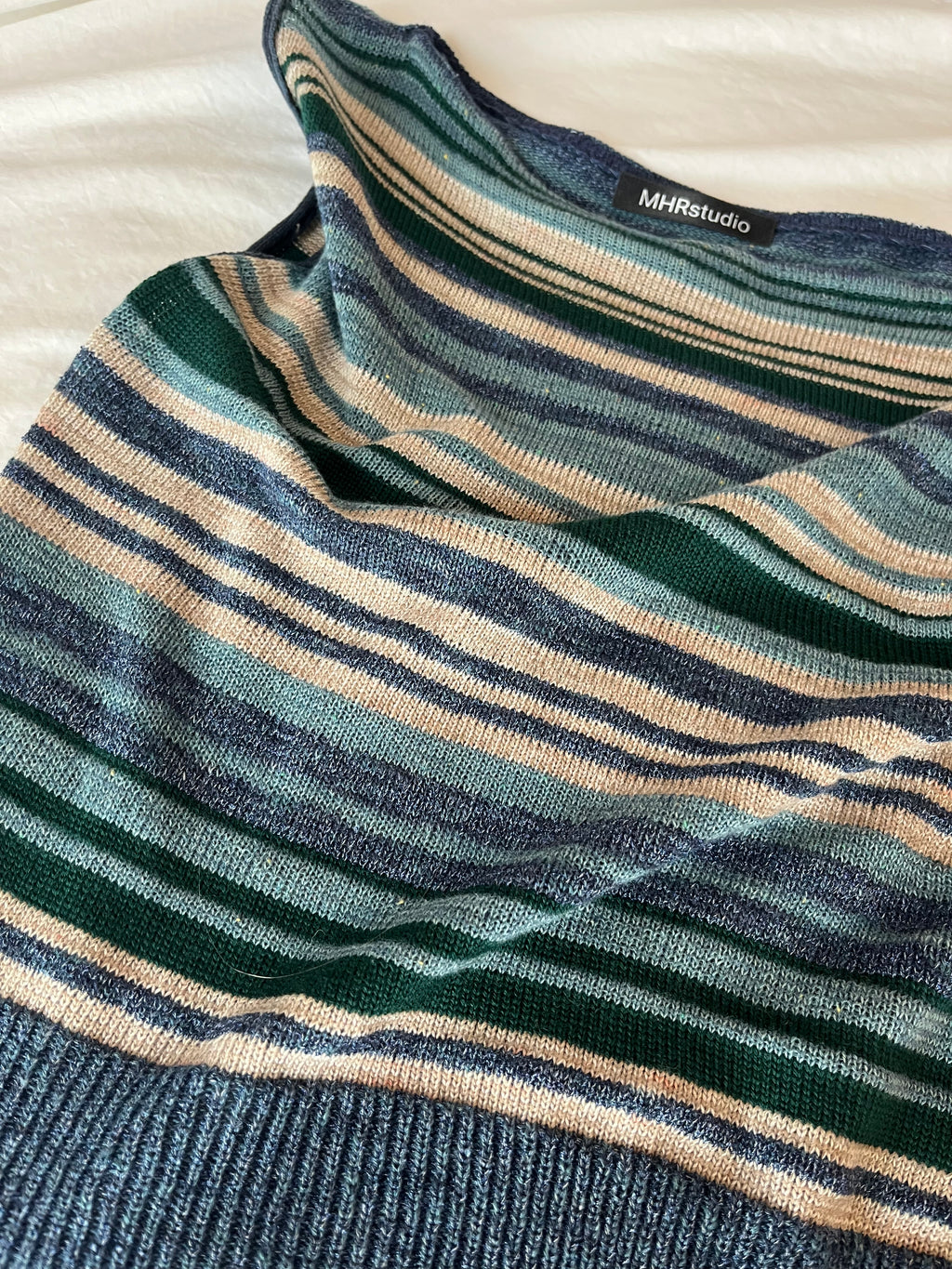 Asymmetric striped top