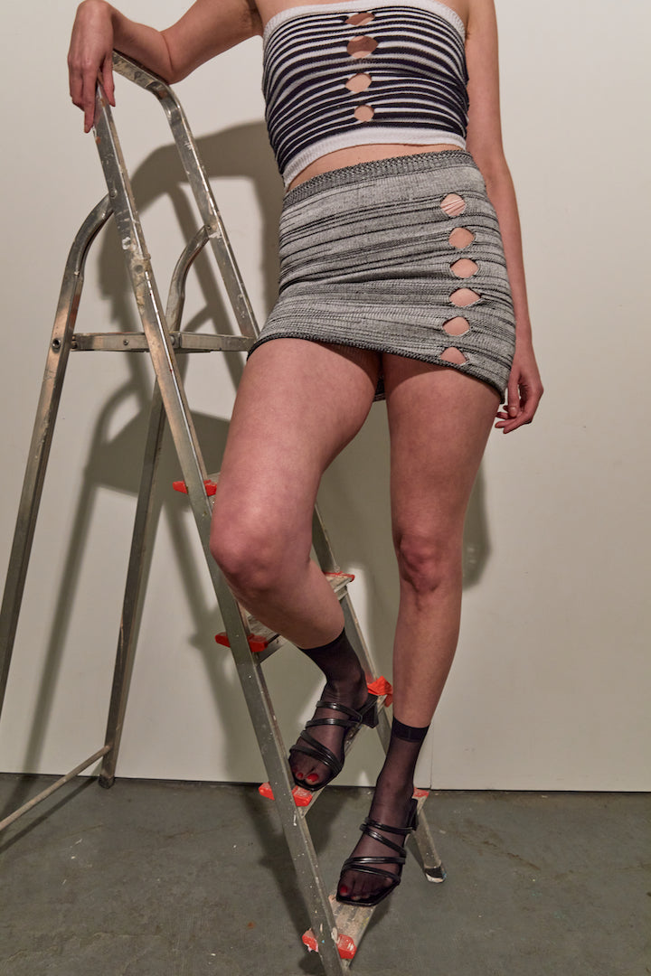 Monochrome Holes Mini Skirt